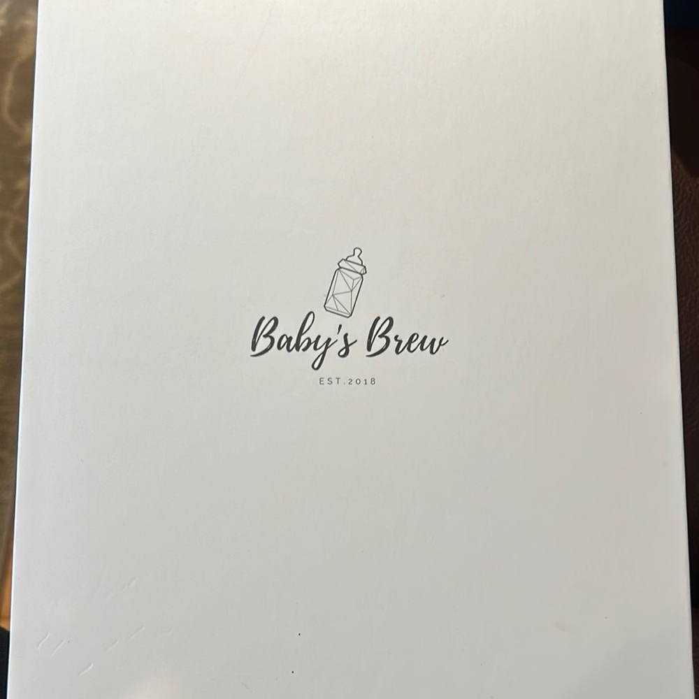 Brand New Baby Brew bottle warmer with formula dispenser!